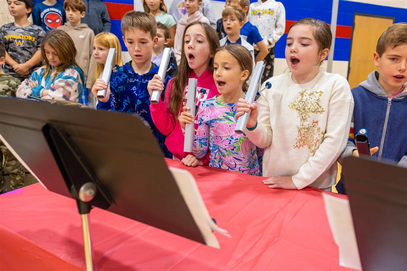 Students play instruments
